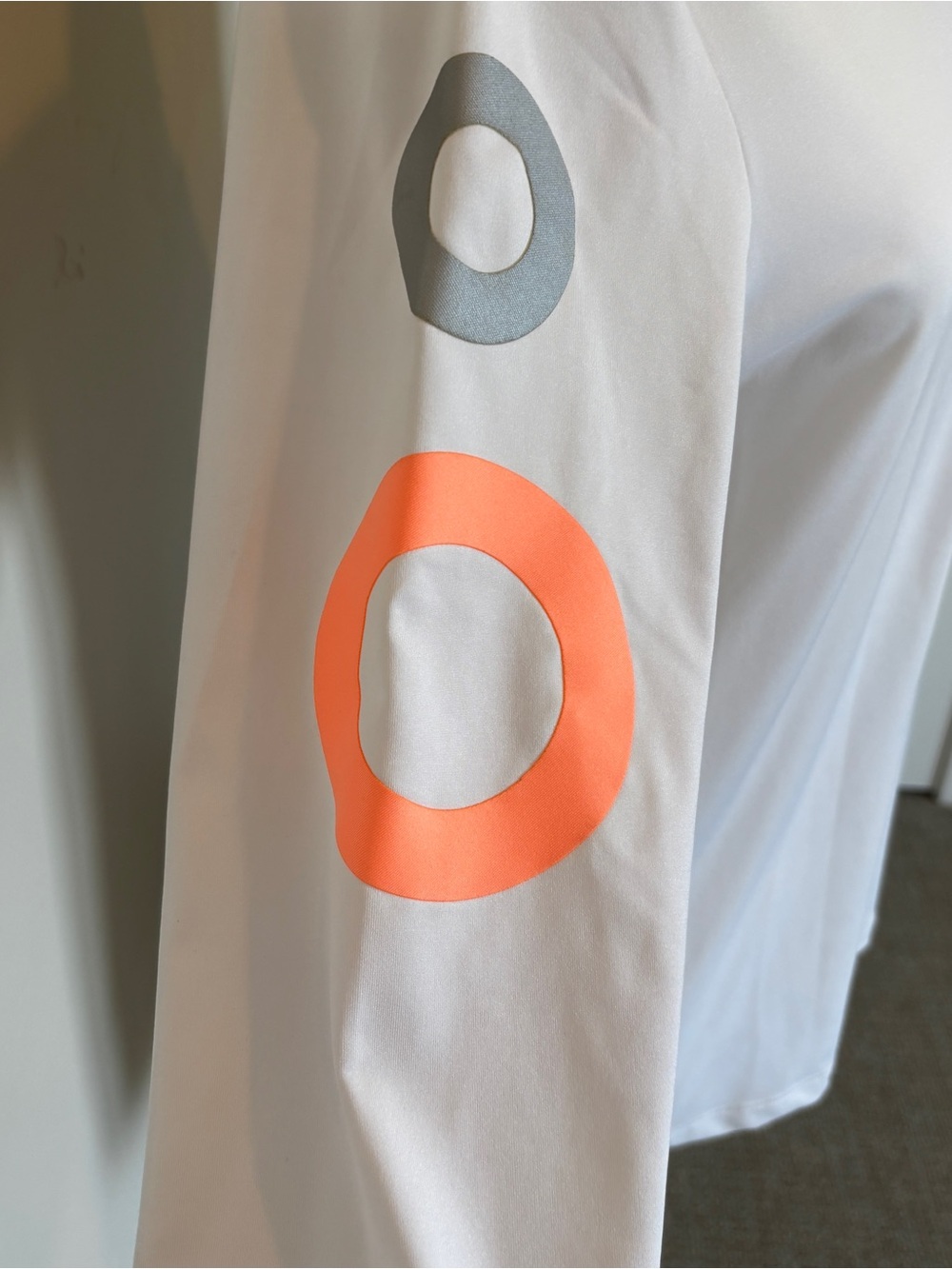 Jamie Sadock White Long Sleeve Half-Zip Top with Neon Orange Accents - Picture 2 of 5